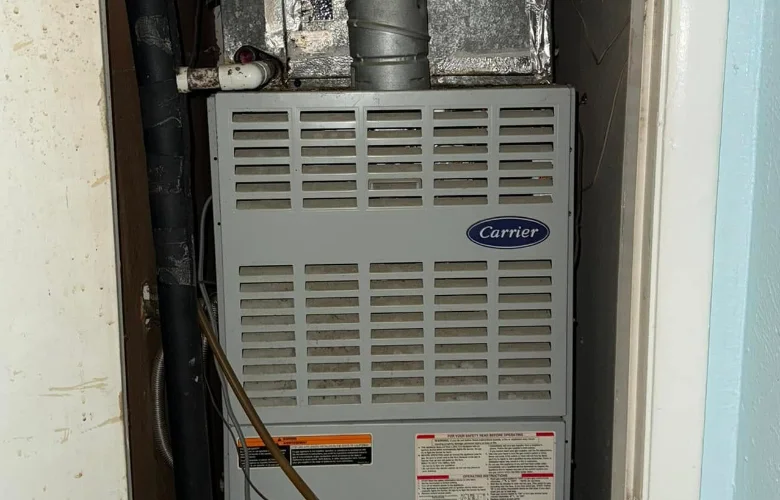 DVO technician servicing furnace unit in Mesquite, TX