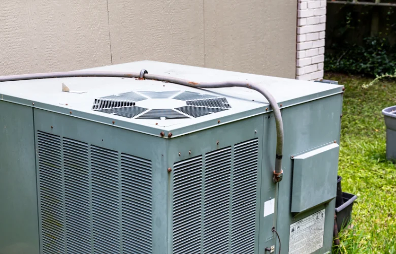 DVO technician servicing package unit in Mesquite, TX